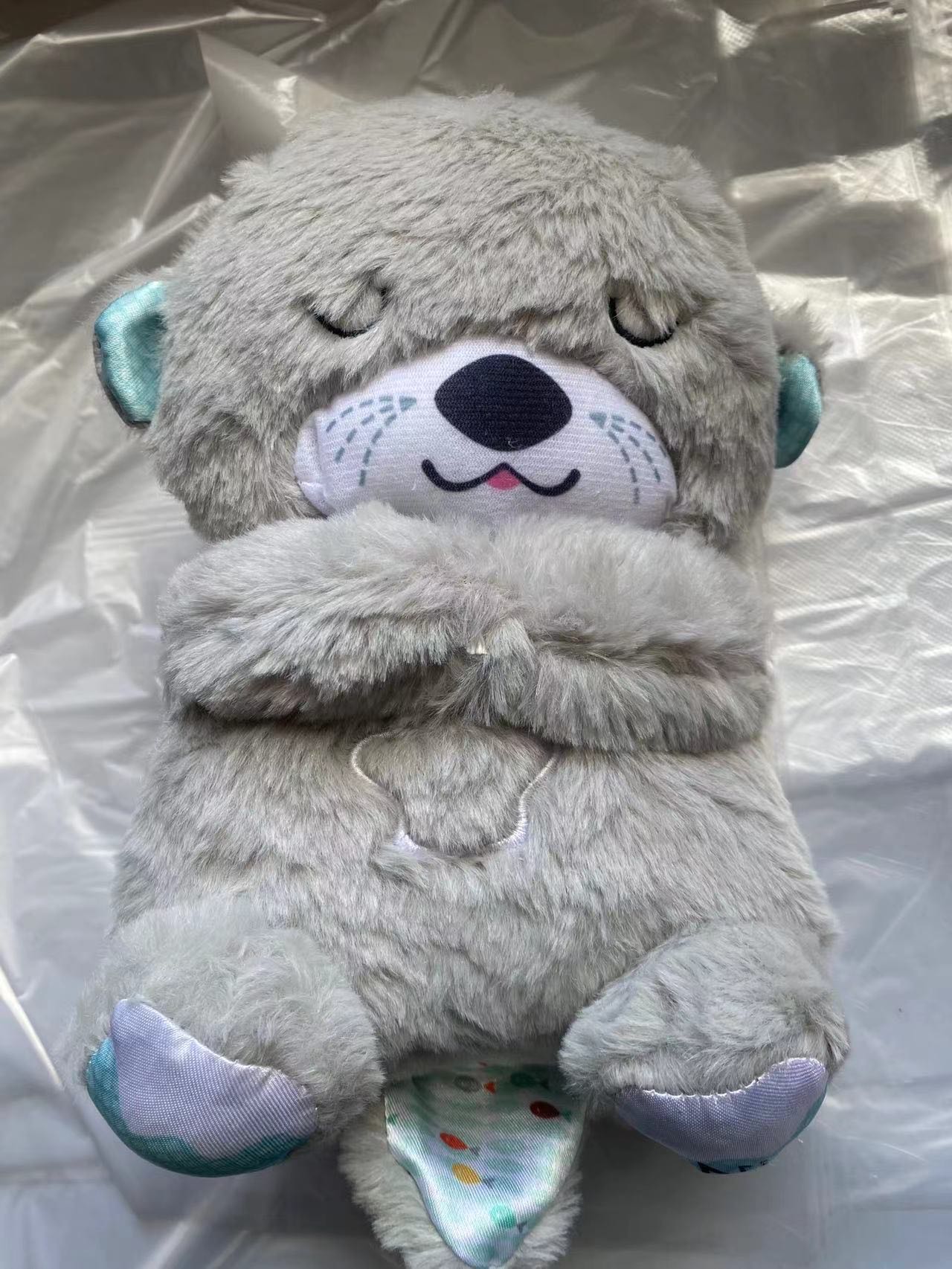Sound Machine Soothe 'n Snuggle Otter Portable Plush Baby Toy with Sensory Details Music Lights & Rhythmic Breathing Motion - The Humanitarians & Robotarians LLC.